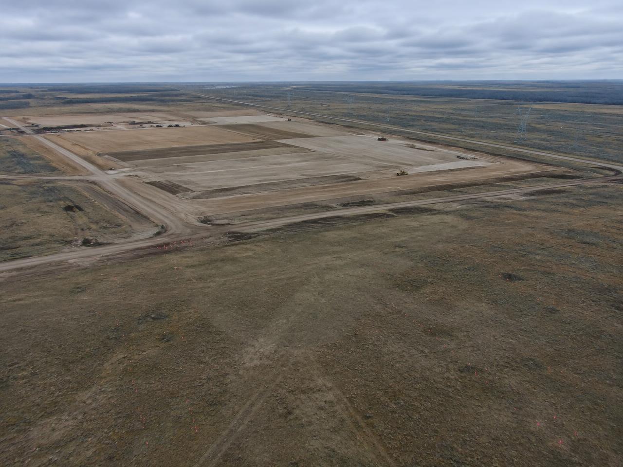 Graded development pad on open land